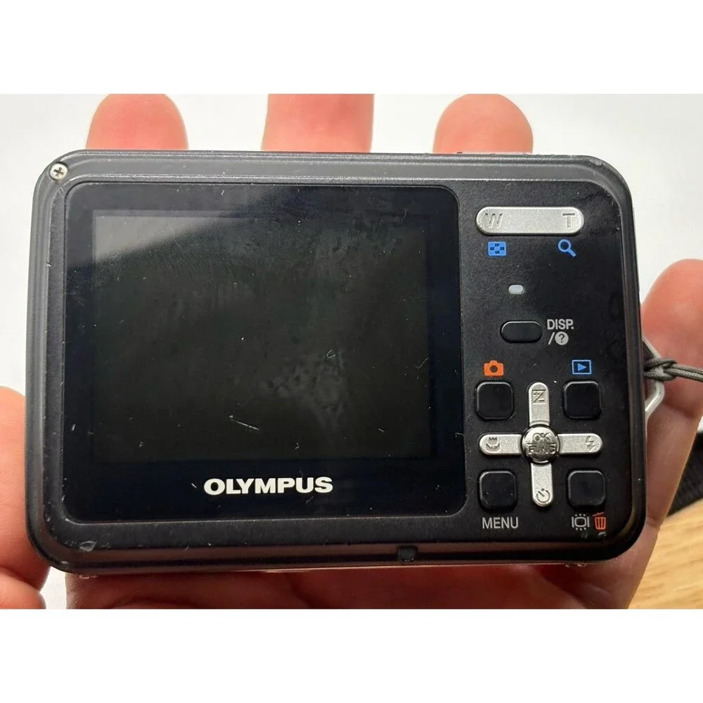 Olympus X-Series X-560WP 10 MP Digital Camera Red w/ 1 Battery and Charger Works